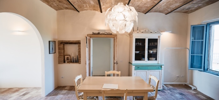Spacious dining room with chandelier